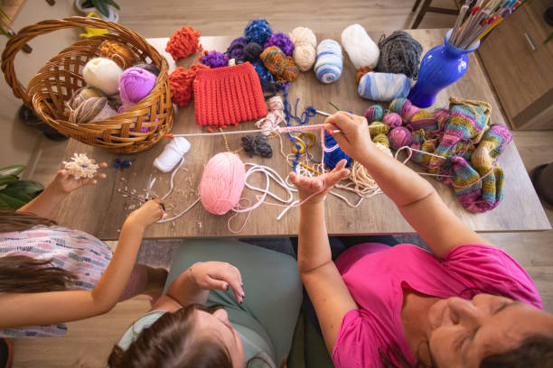 Woman teaching crochet